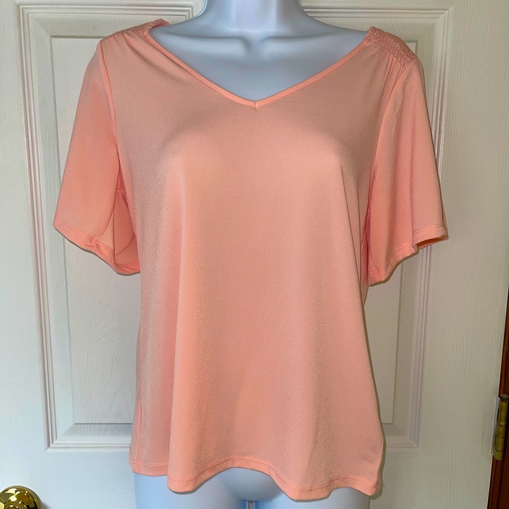 Get ready for summer with this Michael Kors peach top. Brand new with tag!